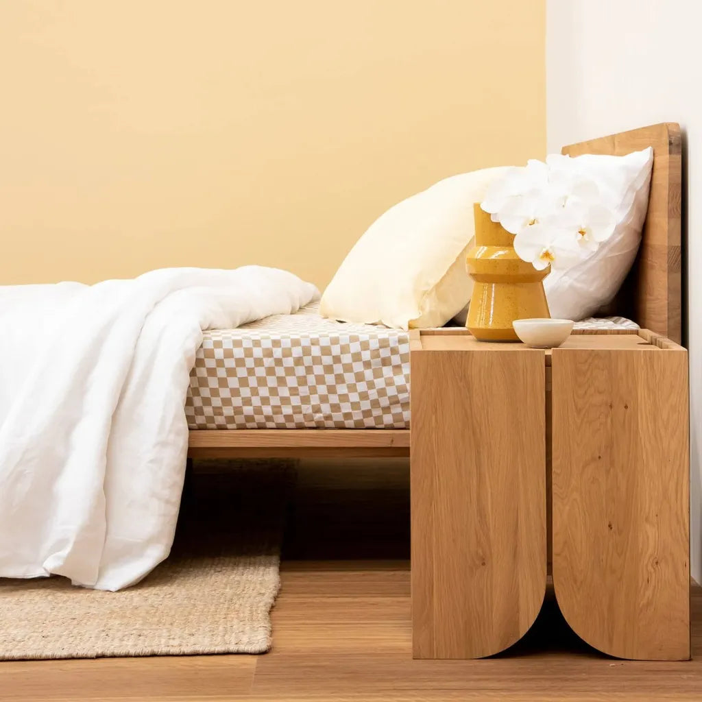 Oak Wood Bedside Table With Curved Panel Design